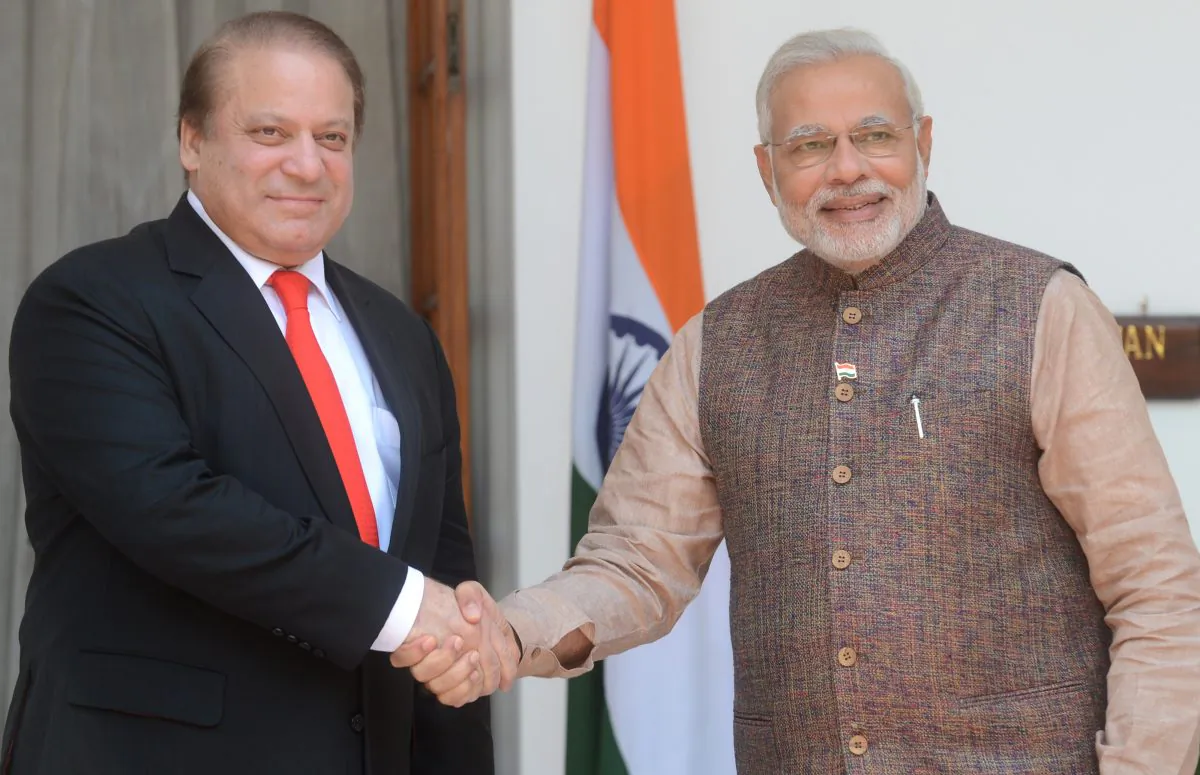 India’s newly sworn-in Prime Minister Narendra Modi (R) shakes hands with Pakistani Prime Minister Nawaz Sharif during a meeting in New Delhi on May 27, 2014. (Raveendran/AFP/Getty Images)