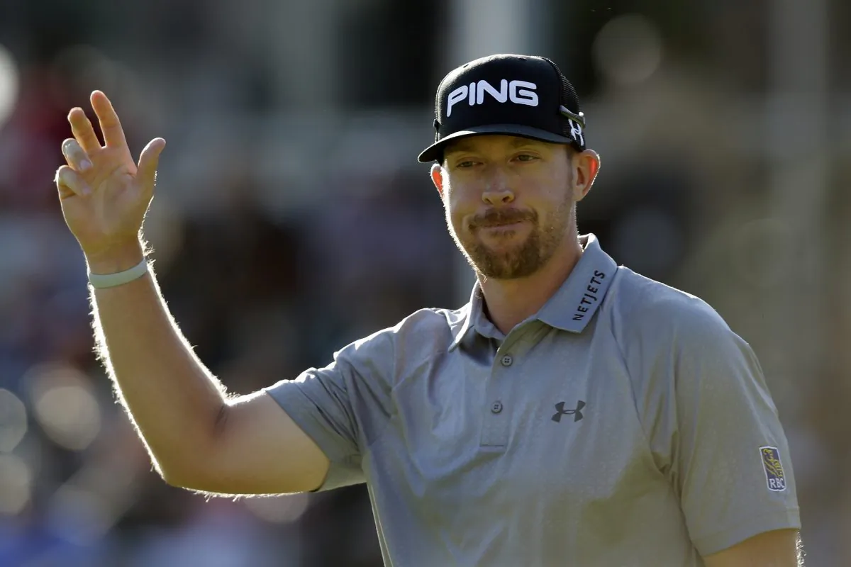 Hunter Mahan waves to fans as he finishes on the 18th hole during the final round of play at The Barclays golf tournament Sunday, Aug. 24, 2014, in Paramus, N.J. Mahan won the tournament. (AP Photo/Mel Evans)