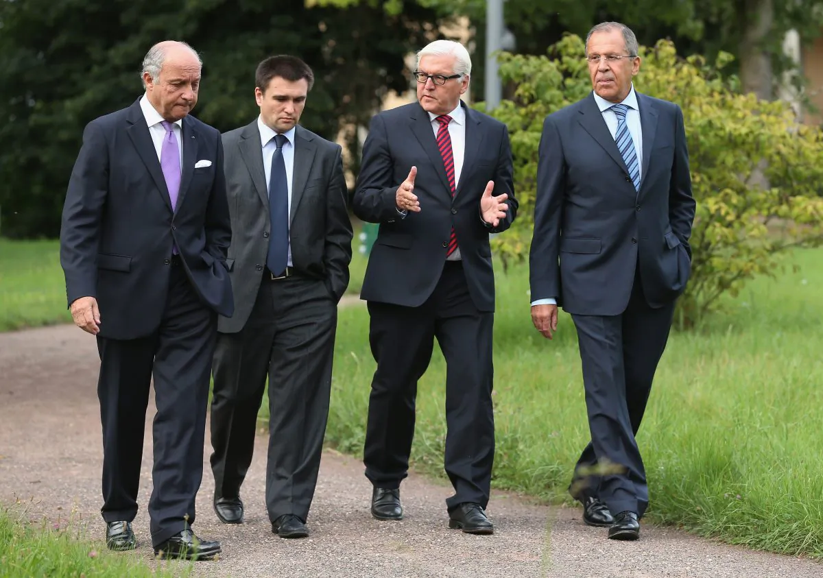 (L-R) French Foreign Minister Laurent Fabius, Ukrainian Foreign Minister Pavlo Klimkin, German Foreign Minister Frank-Walter Steinmeier and Russian Foreign Minister Sergey Lavrov walk in the villa garden while meeting to discuss the ongoing conflict in eastern Ukraine at Villa Borsig on August 17, 2014, in Berlin, Germany. There has been at least one confirmed incursion by military vehicles from Russian soil into Ukraine. (Sean Gallup/Getty Images)