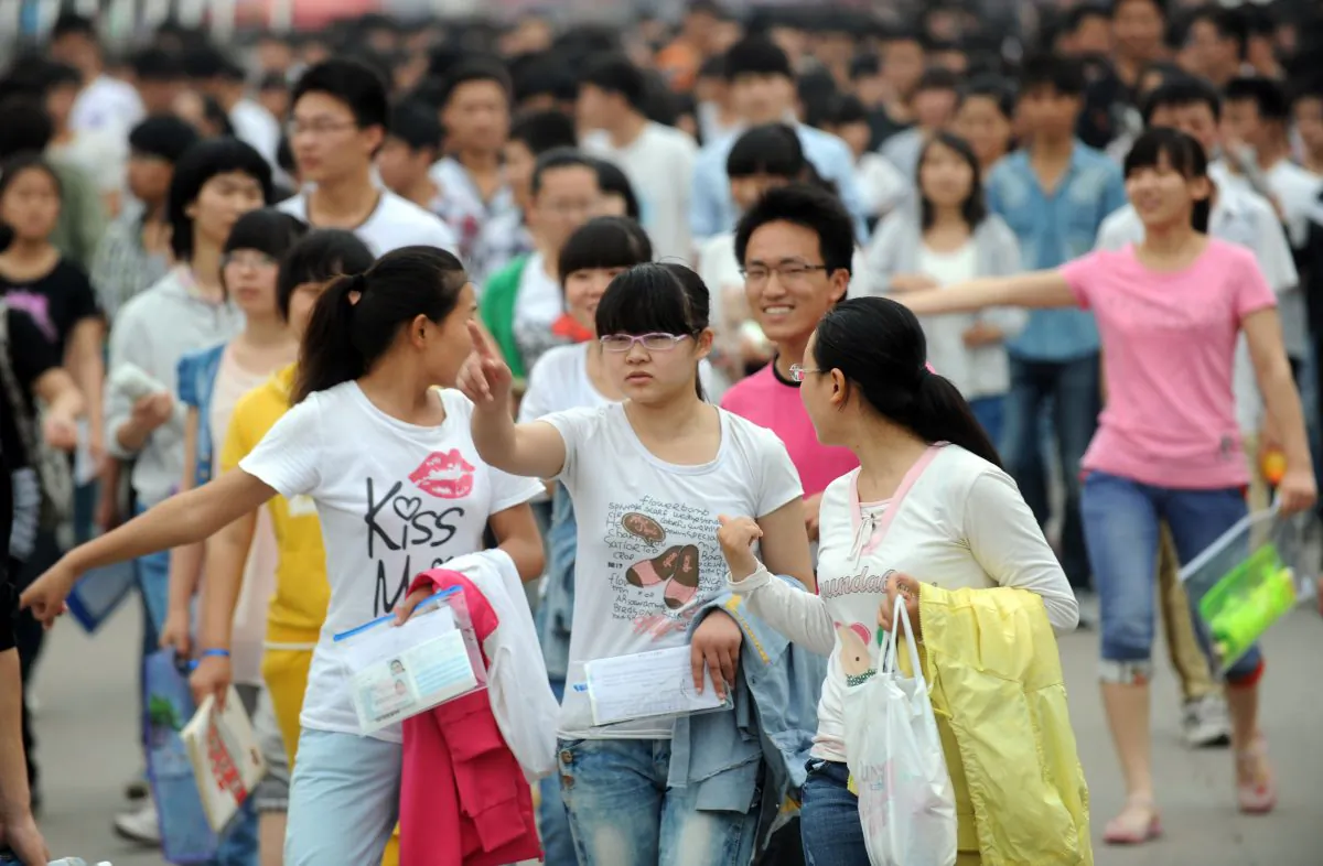 Students walk at a schoolyard before sitting the 2013 university entrance exam in Bozhou, north China's Anhui province on June 7, 2013. (AFP/Getty Images)