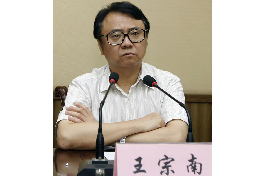 Wang Zongnan of Shanghai Bright Food attending a meeting in Shanghai on July 30, 2012. Wang is one of many executives under investigation for corruption in China. (STR/AFP/Getty Images)