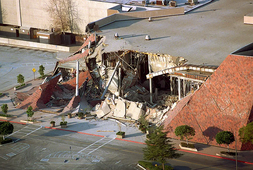 This Jan. 17, 1994 file photo shows a portion of a Bullock's department store that collapsed after the 6.7 magnitude Northridge earthquake. While the city of Los Angeles has made strides in retrofitting brick buildings, work remains to strengthen concrete buildings and housing with underground parking. (AP Photo/Reed Saxon)