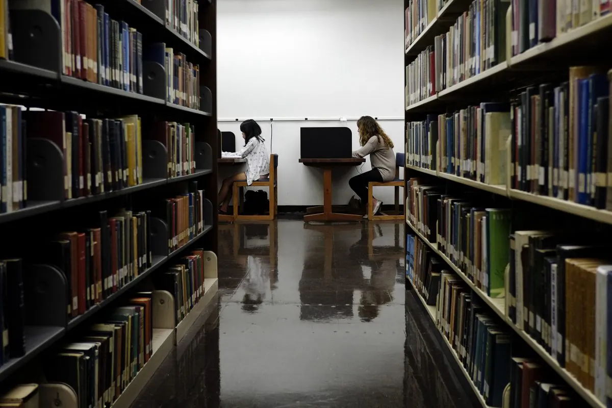 Students study in a library on the campus of California State University–Long Beach in Long Beach, Calif., on Oct. 19, 2012. (Jae C. Hong/AP Photo)