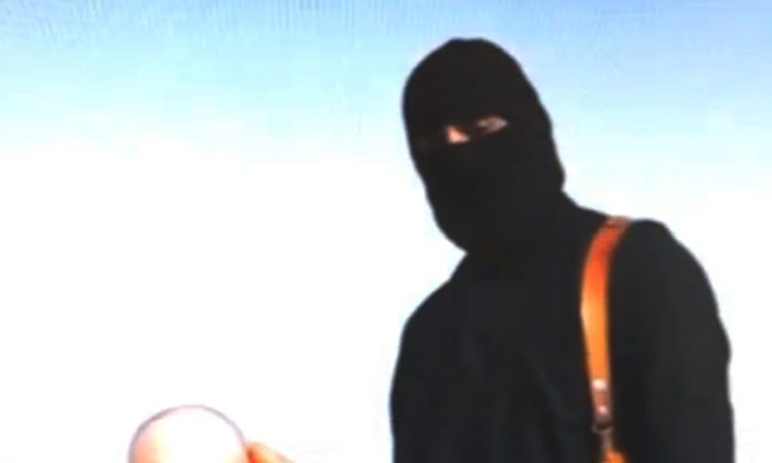 This still image from an undated video released by Islamic State militants on Tuesday, Aug. 19, 2014, purports to show journalist Steven Sotloff being held by the militant group. The Islamic State group has threatened to kill Sotloff if the United States doesn't stop its strikes against them in Iraq. Sotloff's mother, Shirley Sotloff, pleaded for his release Wednesday, Aug. 27, 2014, in a video message aimed directly at his captors that aired on the Al-Arabiya television network. (AP Photo)