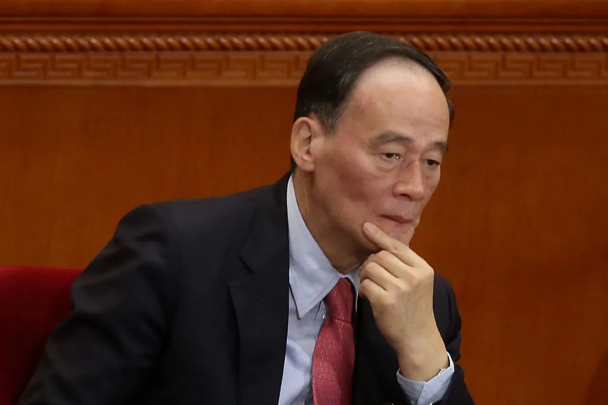 Anti-corruption chief Wang Qishan attends the opening session of the National People's Congress (NPC) at the Great Hall of the People on March 5, 2014 in China. (Feng Li/Getty Images)
