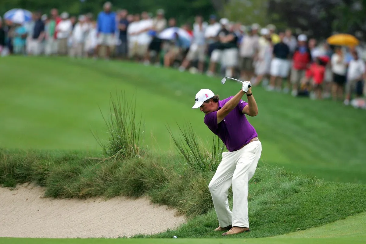 Phil Mickelson hits a shot on the fifth hole during the first round of the Deutsche Bank Championship at TPC Boston on September 3, 2010 in Norton, Massachusetts. (Michael Cohen/Getty Images)