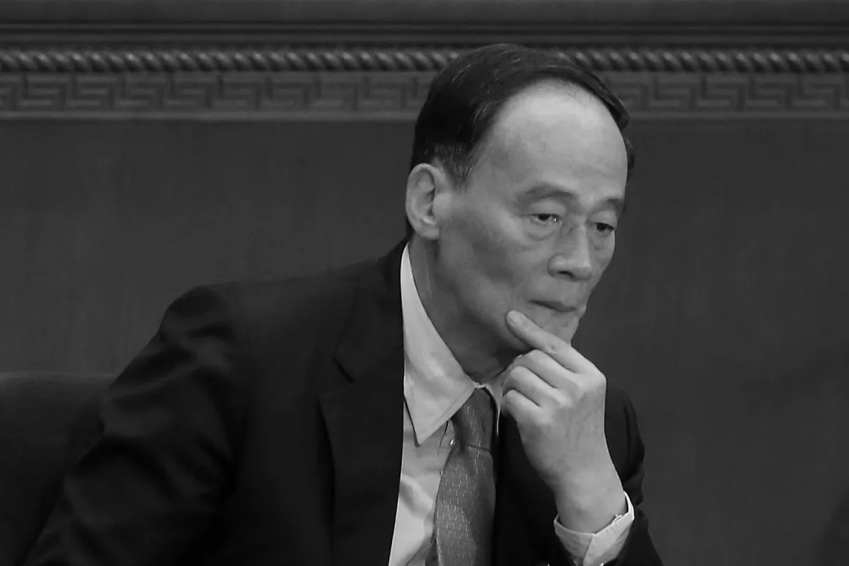 Chinese Politburo Standing Committee member Wang Qishan attends the opening session of the National People's Congress (NPC) at the Great Hall of the People on March 5, 2014 in Beijing, China. Wang recently suggested that bigger targets in the anti-corruption campaign are coming. (Feng Li/Getty Images)