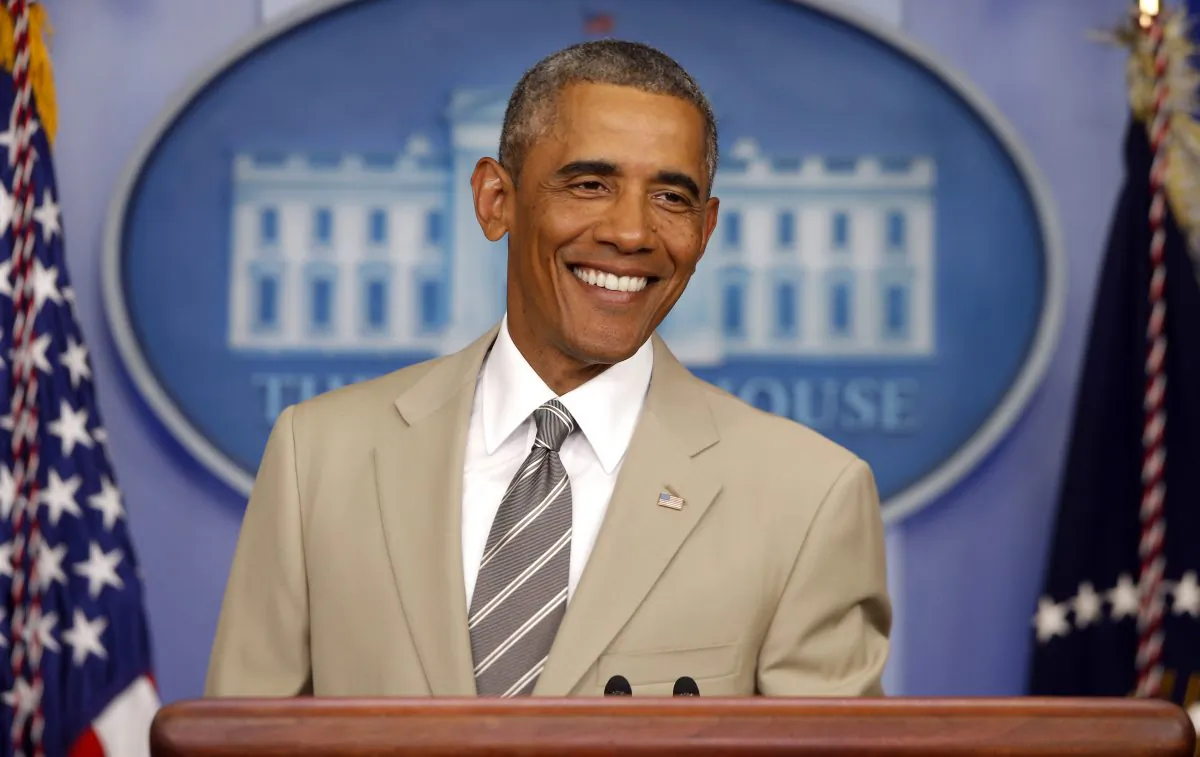 Keep wearing that suit. (AP Photo/Charles Dharapak)