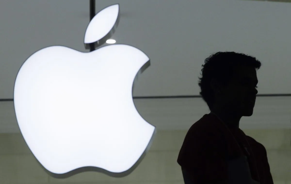 OS X Yosemite was announced by Apple a few months ago, and the Cupertino, Calif.-based giant said it would be coming out in the fall. However, there was no new announcement about the upcoming iOS at Tuesday's event. The company didn't say anything about a beta, either. A person stands near the Apple logo at the company's store in Grand Central Terminal, in New York. Apple will show off its newest products Sept. 9, 2014. The iPhone and iPad maker set the date in invitations mailed Thursday, Aug. 28, 2014, to reporters and others who typically come to see the unveiling of Apple's latest twists on technology. (AP Photo/Mark Lennihan)