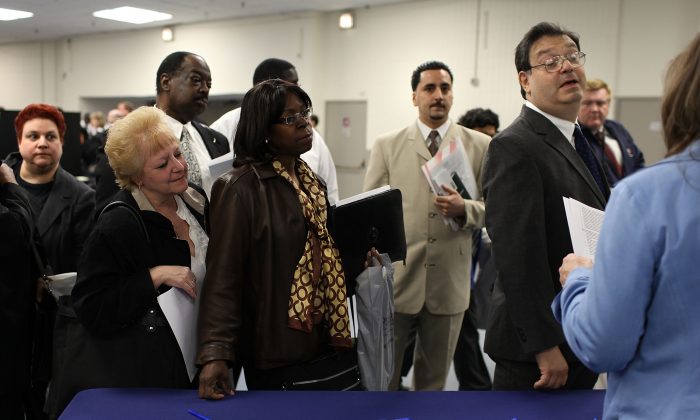 People looking for employment attend an AARP job fair with an emphasis on individuals 50 years old and over in New York City, on April 12, 2010 (Spencer Platt/Getty Images)