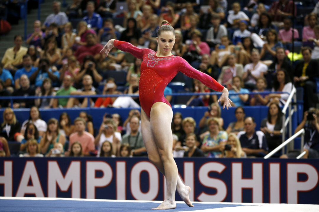 McKayla Maroney competes on the floor exercise during the U.S. women's national gymnastics championships in Hartford, Conn., Saturday, Aug. 17, 2013. (AP Photo/Elise Amendola)