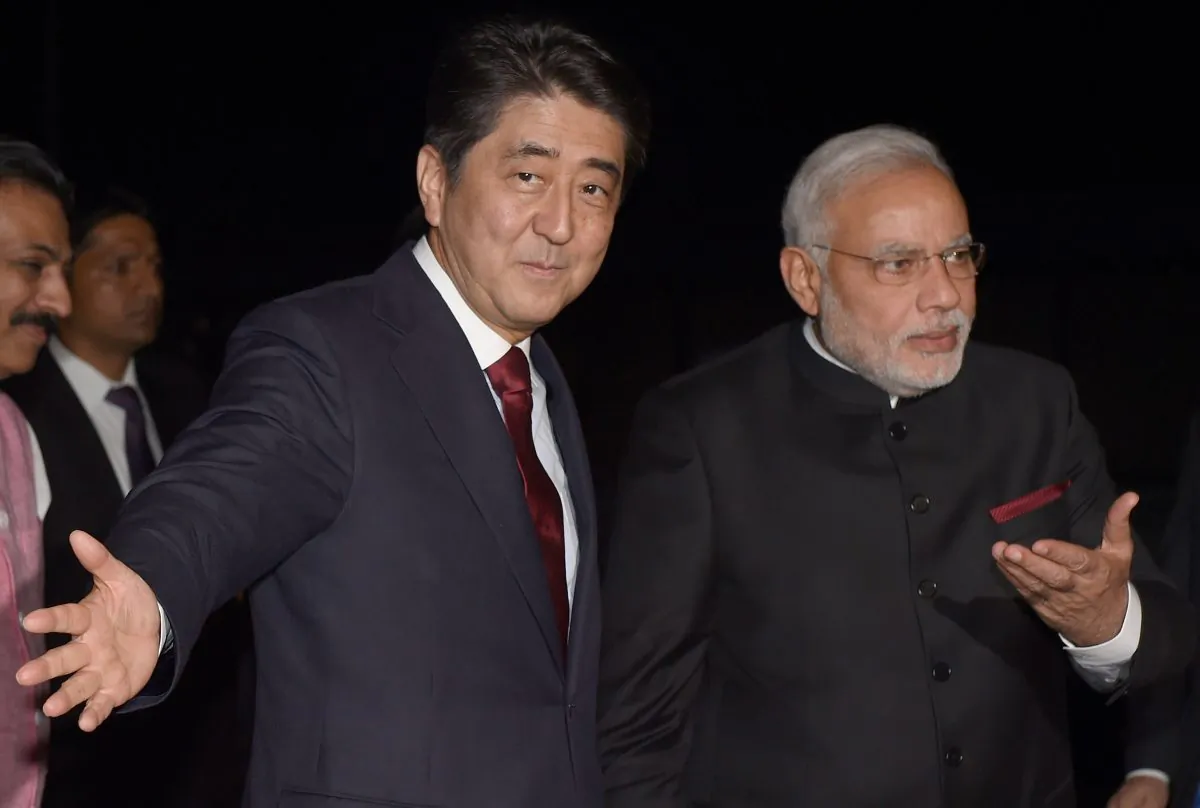 India’s new Prime Minister Narendra Modi (R) is welcomed by his Japanese counterpart Shinzo Abe (L) upon his arrival in Kyoto, Japan, on Aug. 30, 2014. (Toru Yamanaka/AFP/Getty Images)