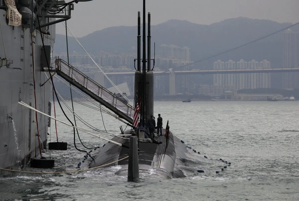 The Los Angeles-class, fast attack submarine USS Hampton (C) sits moored alongside the submarine tender USS Frank Cable (L) during a visit to Hong Kong on May 17, 2011. China is researching and deploying systems to fight U.S. submarines. (Vincent Yu/AFP/Getty Images)