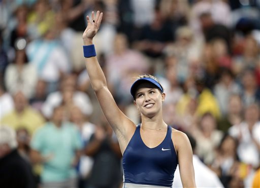 Eugenie Bouchard, of Canada, waves to the crowd after defeating Barbora Zahlavova Strycova, of the Czech Republic, in the third round of the 2014 U.S. Open tennis tournament Saturday, Aug. 30, 2014, in New York. (AP Photo/Darron Cummings)