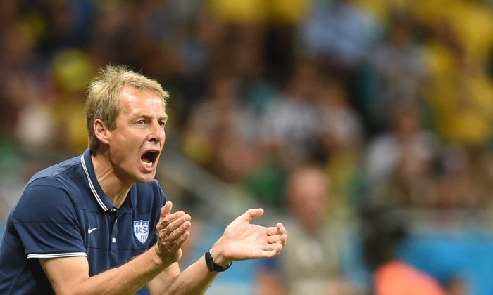 US German coach Juergen Klinsmann reacts during the first half of extra-time in the Round of 16 football match between Belgium and USA at Fonte Nova Arena in Salvador during the 2014 FIFA World Cup on July 1, 2014. (FRANCISCO LEONG/AFP/Getty Images)