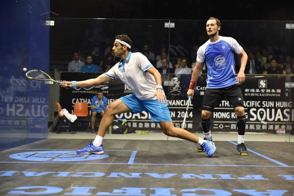 Mohamed Elshorbagy of Egypt plays a forehand volley during his match against Gregory Gaultier of France during the Final of the Hong Kong Squash Open 2014 at the HKPSC on Sunday Aug 31, 2014. Elshorbagy won the match 3 games to 2. (Bill Cox/Epoch Times)