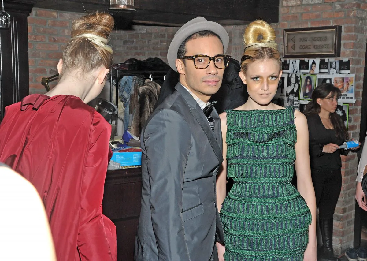 Designer Victor dE Souza backstage before his fall 2012 fashion show during Mercedes-Benz Fashion Week at The Bowery Hotel on February 10, 2012 in New York City. (Photo by Joe Corrigan/Getty Images)
