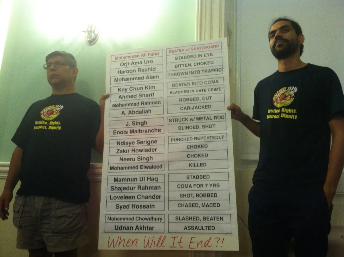Members of the New York City Taxi Workers Alliance at a public hearing held at City Hall in New York, on Wednesday, Sept. 3, 2014. The city council transportation committee pushed a bill that would require all cab drivers to post a warning that assaults on drivers could result in up to 25 years in prison. (Annie Wu/Epoch Times)