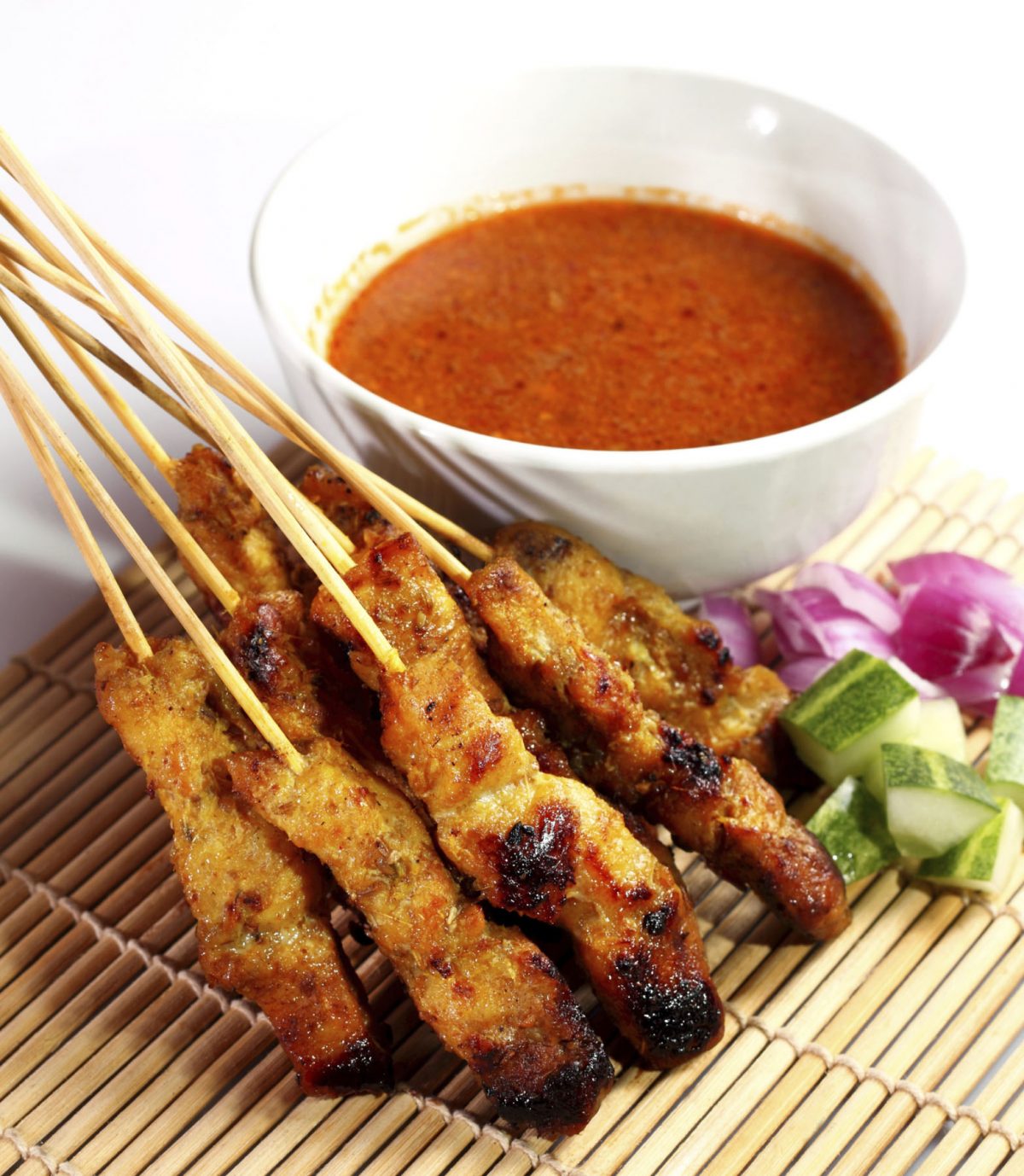 Grilled pork on skewers with peanut sauce. (dolphfyn/iStock/Thinkstock)