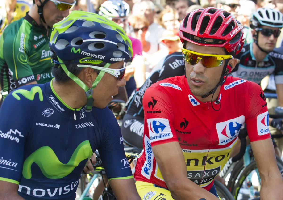 Movistar's Nairo Quintana chats with race leader Alberto Contador of Tinkoff-Saxo before the start of Stage 11 of the 69th Vuelta a España. Quintana crashed after 14 minutes of racing and had to withdraw. (Jaime Reina/AFP/Getty Images)
