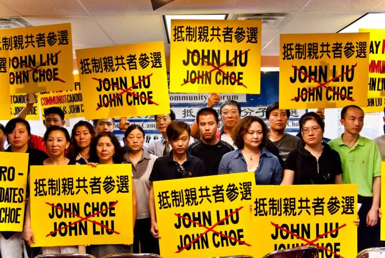 Representatives from the Chinese and Korean community protest John Liu during an August 2009 event in Flushing, Queens, New York. (Epoch Times)