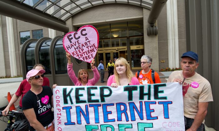 Protesters hold a rally to support “net neutrality” at the Federal Communications Commission (FCC) in Washington, D.C., on May 15, 2014. (Keren Bleier/AFP/Getty Images)