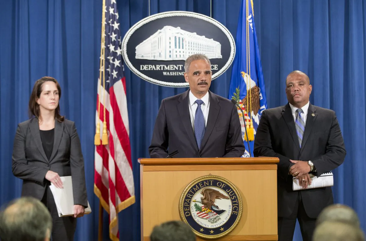 U.S. Attorney General Eric Holder announces a Justice Department 'patterns and practice' investigation of the Ferguson, Mo., police department during a news conference in Washington on Sept. 4, 2014. (Chip Somodevilla/Getty Images)