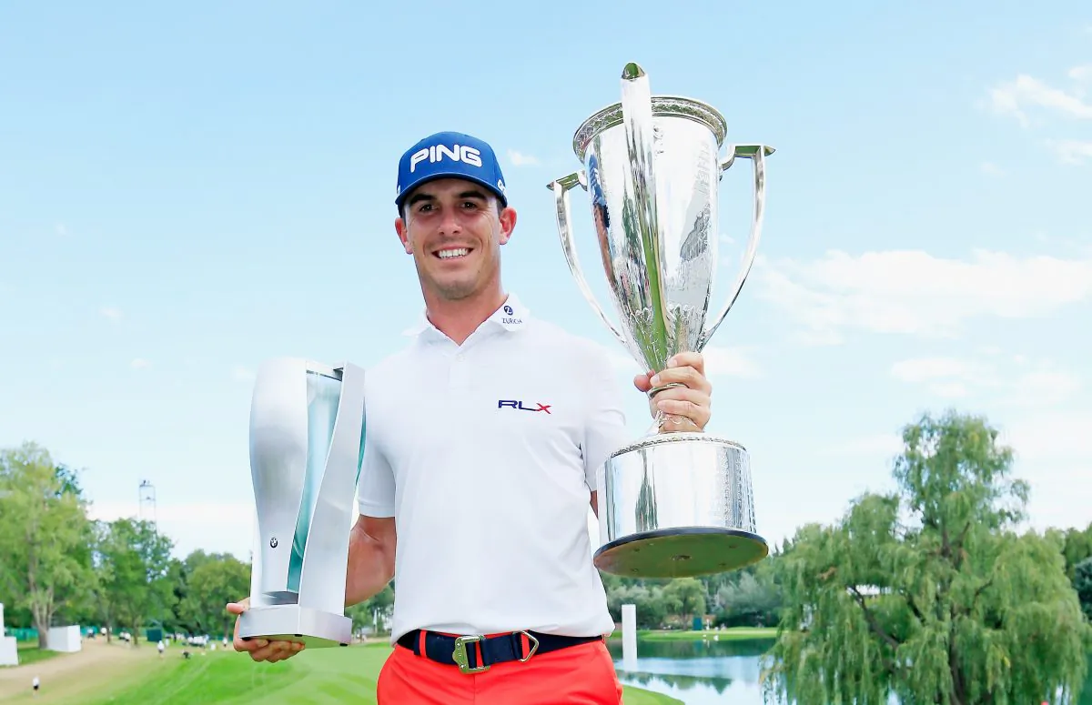 Billy Horschel of the United States poses with the BMW trophy (L) and J.K. Wadley trophy (R) after his two-stroke victory at the of the BMW Championship at the Cherry Hills Country Club on September 7, 2014 in Cherry Hills Village, Colorado. (Jamie Squire/Getty Images)