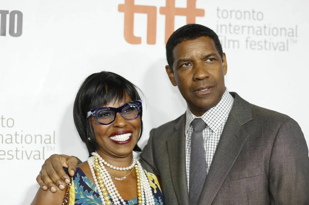 Actor Denzel Washington and wife Paulette Washington attend the red carpet premiere of "The Equalizer" at the Toronto International Film Festival (TIFF) on September 7, 2014. (Eric Sun/Epoch Times)