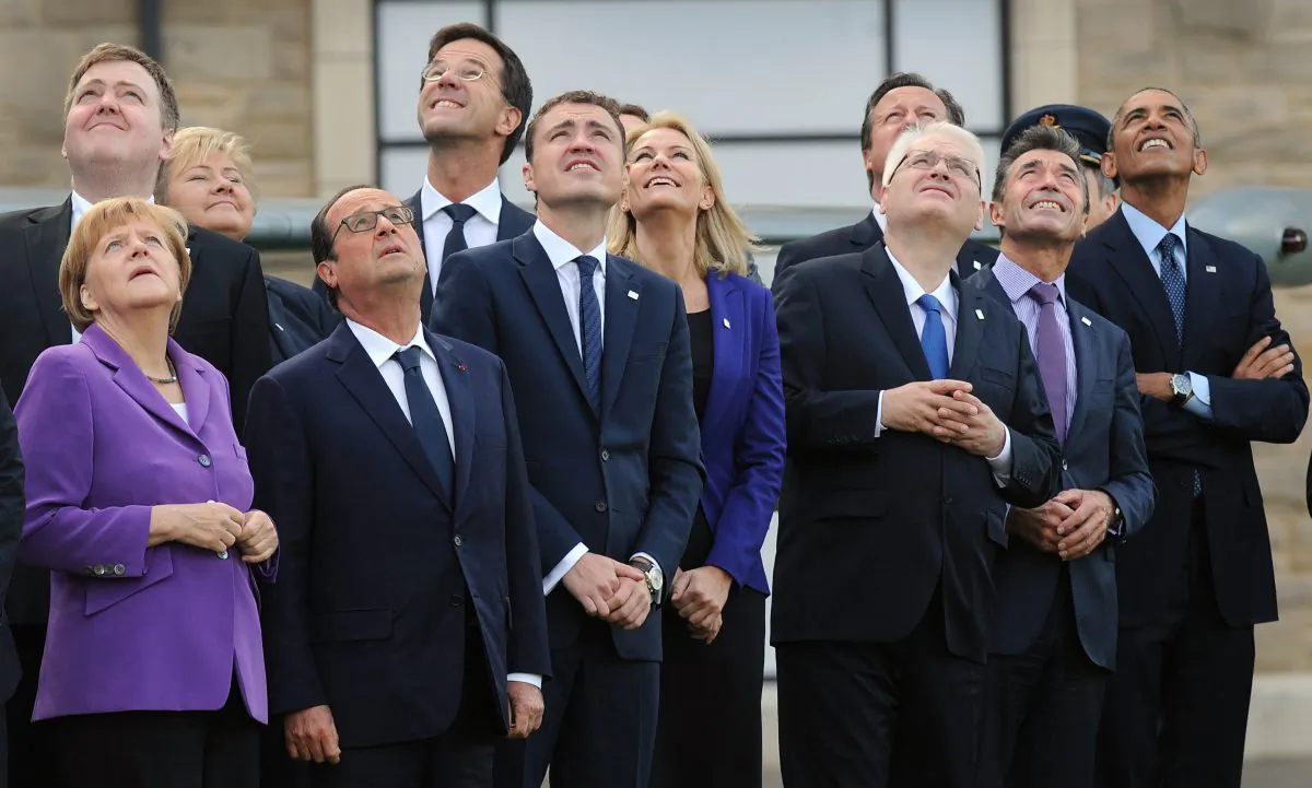 NATO leaders watch a flypast of military aircraft from NATO member countries during the summit in Newport, Wales, U.K., on Sept. 5, 2014. (Stefan Rousseau/WPA Pool/Getty Images)