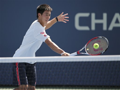 Kei Nishikori, of Japan, returns a shot during a practice session in preparation for Monday's championship match against Marin Cilic, of Croatia, the 2014 U.S. Open tennis tournament, Sunday, Sept. 7, 2014, in New York. (AP Photo/Mike Groll)