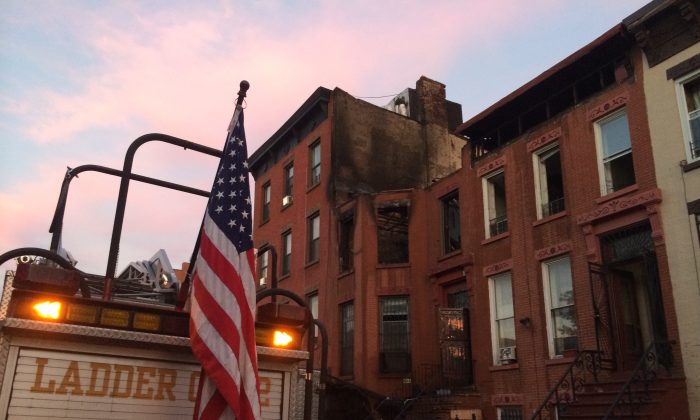Five firefighters were injured putting out a blaze at 684 Halsey St. in Brooklyn’s Bed-Stuy neighborhood on September 7, 2014. (Matt Gnaizda/Epoch Times)
