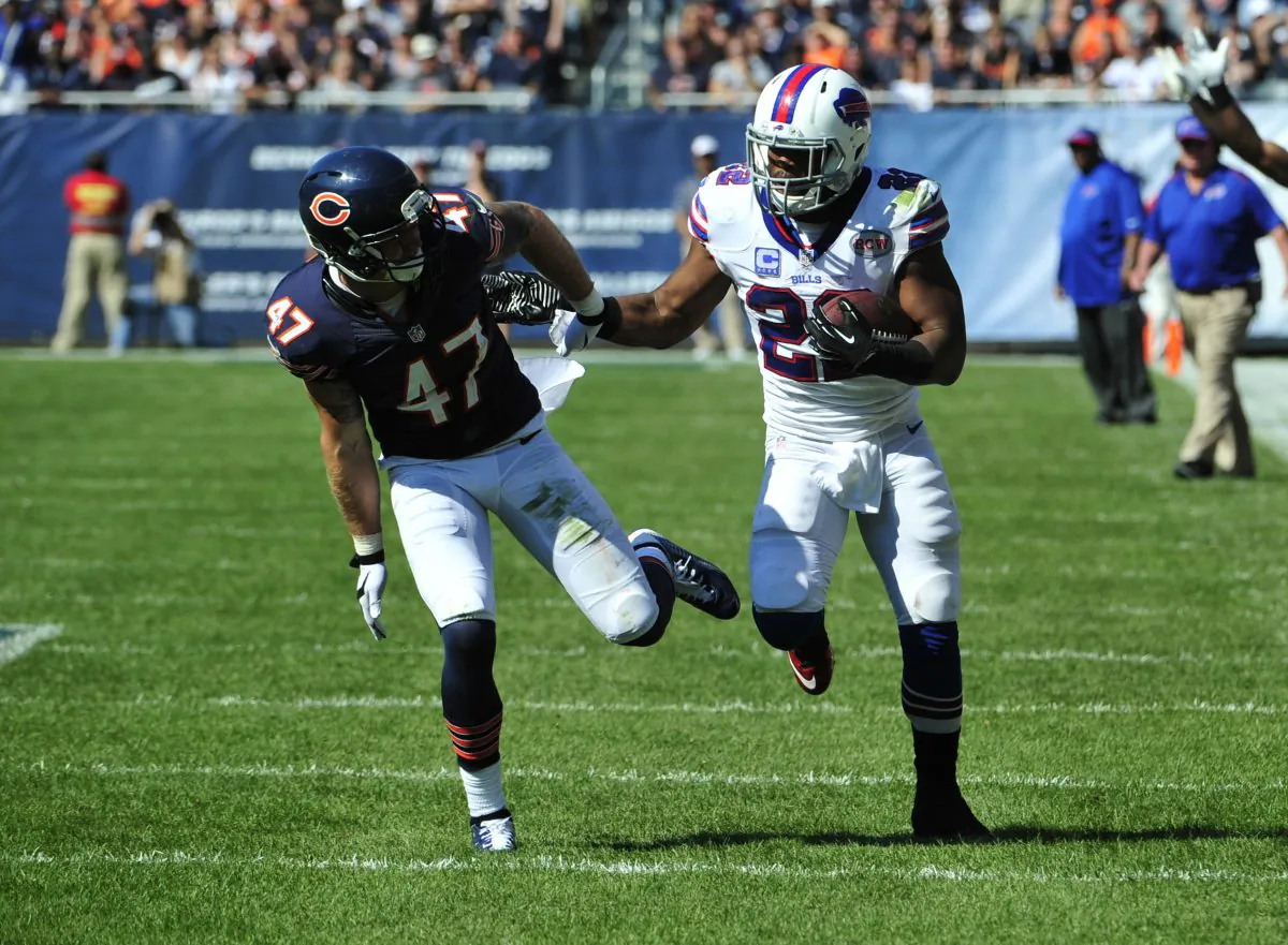 Fred Jackson (R) of the Buffalo Bills prepares to give Chris Conte of the Chicago Bears a stiff-arm in overtime at Soldier Field in Chicago on Sept. 7, 2014. (David Banks/Getty Images)