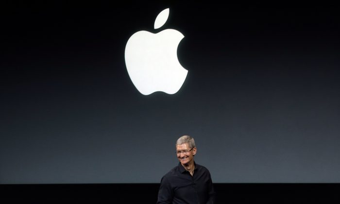 Apple CEO Tim Cook speaks on stage before a new product introduction in Cupertino, Calif. (AP Photo/Marcio Jose Sanchez)