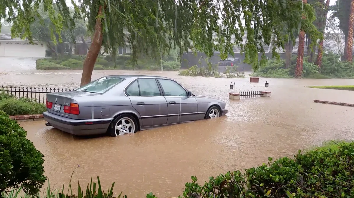Thunderstorms and heavy rains left over from Hurricane Norbert bring flash floods to Riverside, Calif. on Sept. 7. (Alex Leach)