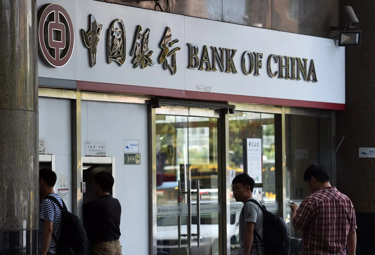 Bank of China posted 12.58 billion yuan (US$2 billion) in non-performing loans in the first half of this year. Banks in China are seeing a significant increase in non-performing loans as the country's economy cools. (Greg Baker/AFP/Getty Images) 
