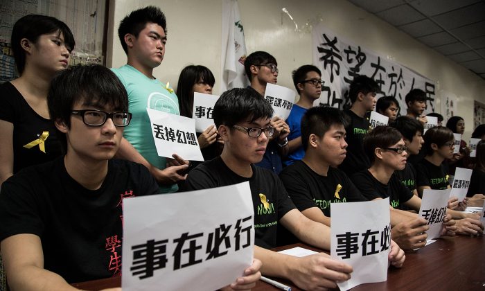 Hong Kong Federation of Students Union, a Hong Kong student organization, announced its planned strike by university students on Sept. 7, 2014 in Hong Kong. Hong Kong’s Occupy Central organizers also shaved their heads on Tuesday to express their determination of fighting for universal suffrage against Beijing’s restriction. (Lam Yik Fei/Getty Images)