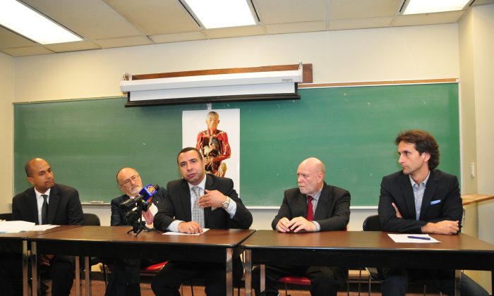 (L-R) Choose Humanity's lawyer Joel Etienne; Rabbi Reuven Bulka; Rev. Majed El Shafie, founder of One Free World International; Sanderson Layng, president of the Canadian Centre for Abuse Awareness; and Choose Humanity spokesperson Joel Chipkar hold a press conference in Toronto on Sept. 9, 2014. (Allen Zhou/Epoch Times)