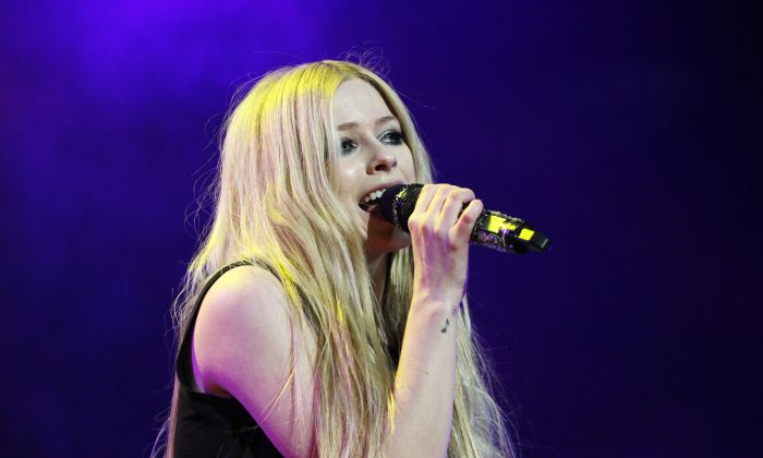 Avril Lavigne, performing in Atlanta in 2013, is one of the victims of the massive hack and the user Fappening Report claims that it has other pictures of her and other celebrities and is trying to sell them. (Robb D. Cohen/Invision/AP)