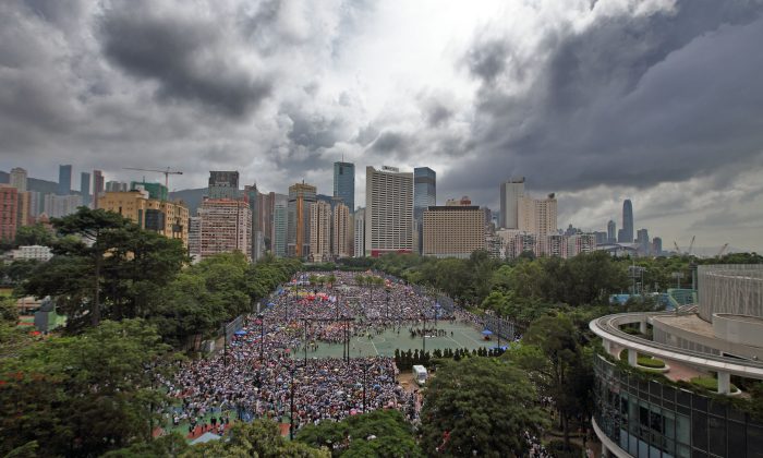 People flock to Victoria Park to join the July 1, 2014, march to protest against the communist regime. (Poon/Epoch Times)