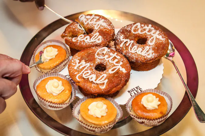 “Citymeals Cupcakes” and Sweet Potato Pound Cake from Make My Cake. (ERIC VITALE PHOTOGRAPHY)