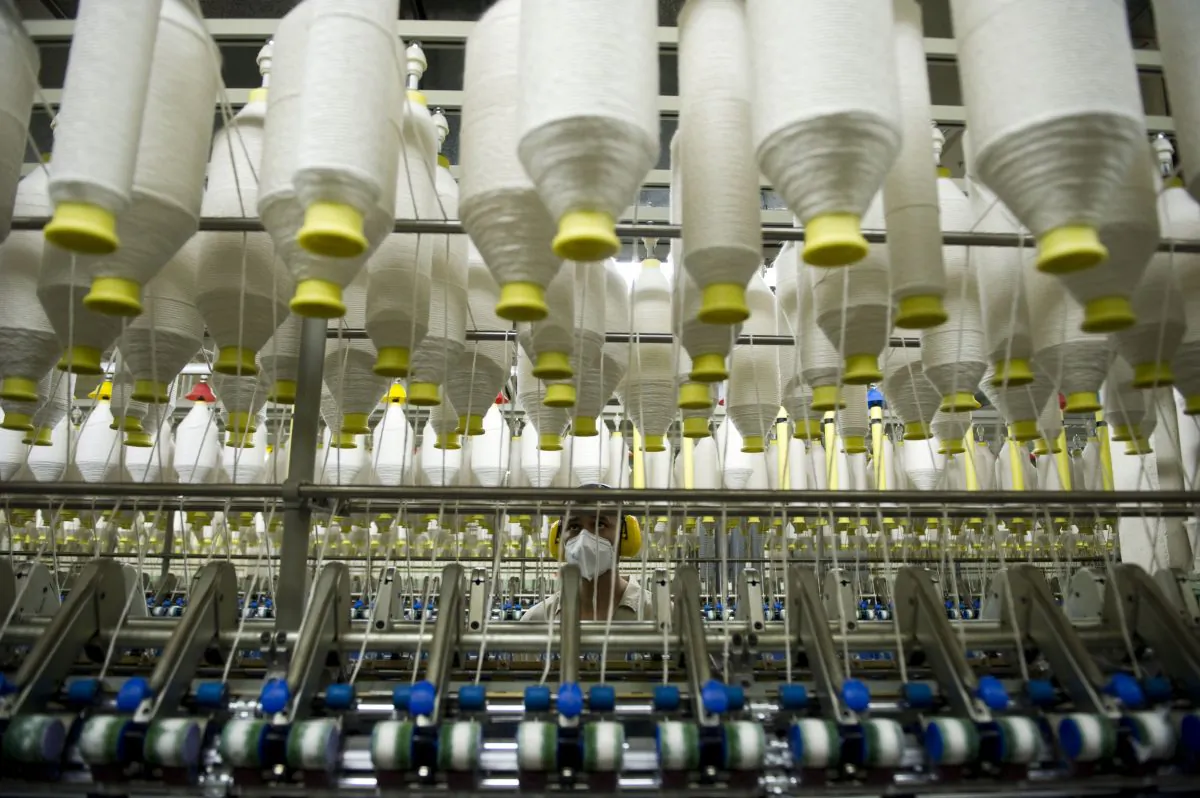 An employee works in a textile factory in Colombia on May 10, 2012, shortly before the free trade agreement (NAFTA) signed in 2006 between United States and Colombia came into force. (Raul ArboledaA/AFP/GettyImages)
