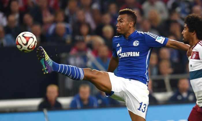 Schalke's Cameroon forward Eric Maxim Choupo-Moting vies for the ball during the German first division Bundesliga football match Schalke 04 vs Bayern Munich in Gelsenkirchen, western Germany on August 30, 2014. (PATRIK STOLLARZ/AFP/Getty Images)