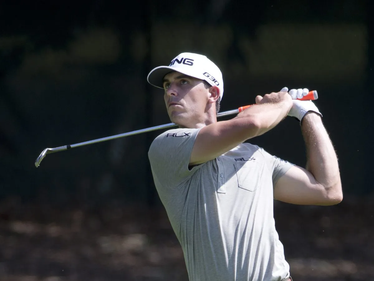 Billy Horschel hits from the fairway on the third hole during the second round of play in the Tour Championship golf tournament, Friday, Sept. 12, 2014, in Atlanta. (AP Photo/John Bazemore)