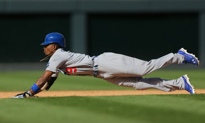 Dee Gordon of the Los Angeles Dodgers, in this July 5, 2014 photo, has been the team's offensive catalyst hitting out of the leadoff spot. (Justin Edmonds/Getty Images) 