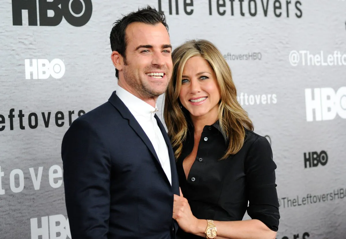Actors Justin Theroux and Jennifer Aniston attend HBO's "The Leftovers" season premiere at the NYU Skirball Center on Monday, June 23, 2014 in New York. Theroux breaks his silence on the Angelina Jolie and Brad Pitt divorce.(Photo by Evan Agostini/Invision/AP)