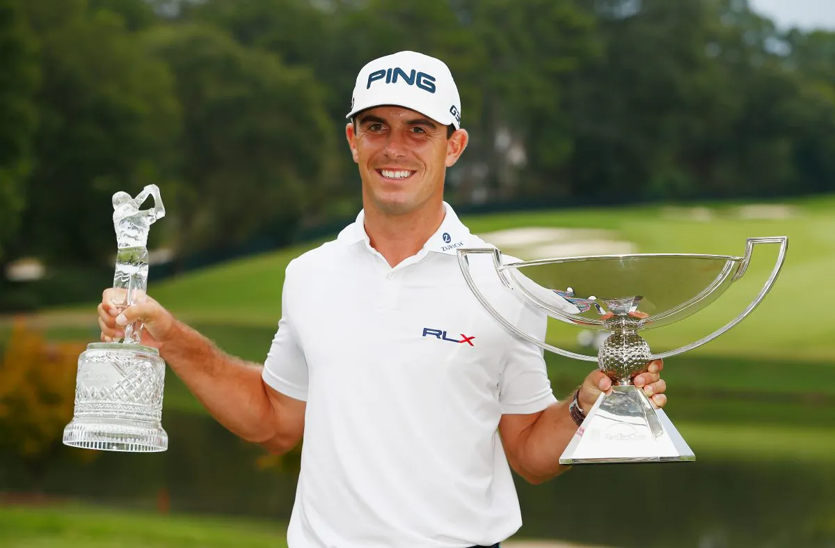 Billy Horschel poses on the 18th green after winning both the TOUR Championship and the FedExCup Playoffs at the East Lake Golf Club. (Sam Greenwood/Getty Images) 