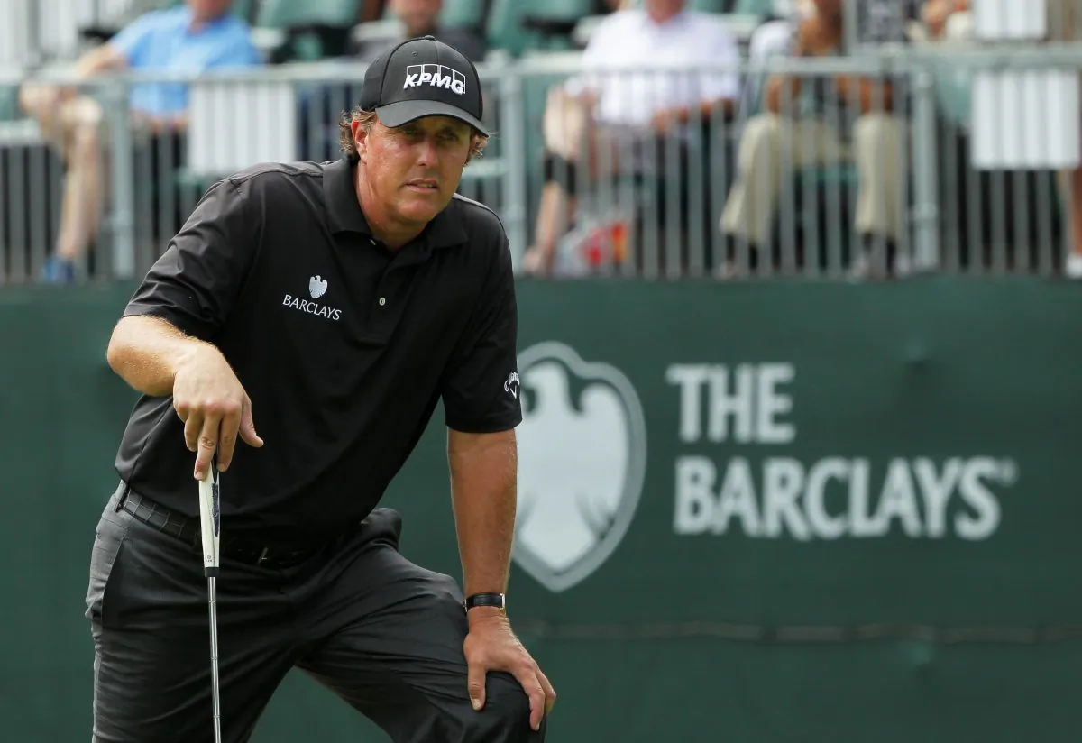 Phil Mickelson lines up a putt on the 18th green during the second round of The Barclays at The Ridgewood Country Club on August 22, 2014 in Paramus, New Jersey. (Hunter Martin/Getty Images)