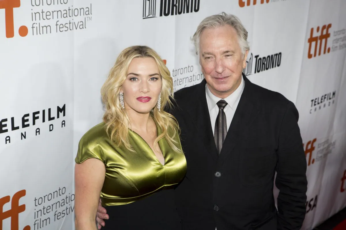 Kate Winslet and Alan Rickman attend the red carpet premiere of "A Little Chaos", Sept. 13, 2014, in which she plays a revolutionary garden designer in the court of Louis XIV, who is played by Rickman. (Evan Ning/Epoch Times)