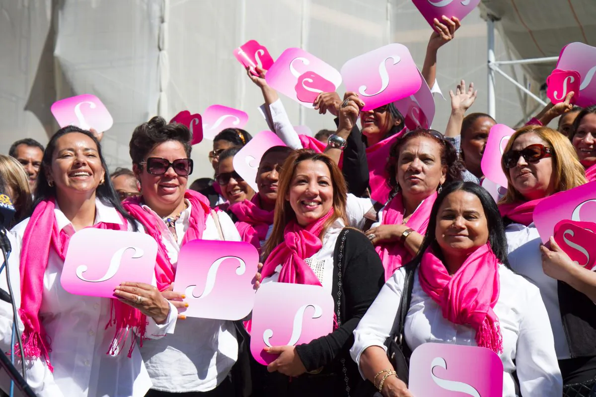Female SheRides drivers show their support in at a press event for She Rides at City Hall in New York City, on Sept. 15, 2014. (Benjamin Chasteen/Epoch Times)